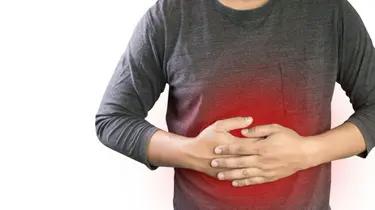 a man experiencing stomach pain and digestive issues